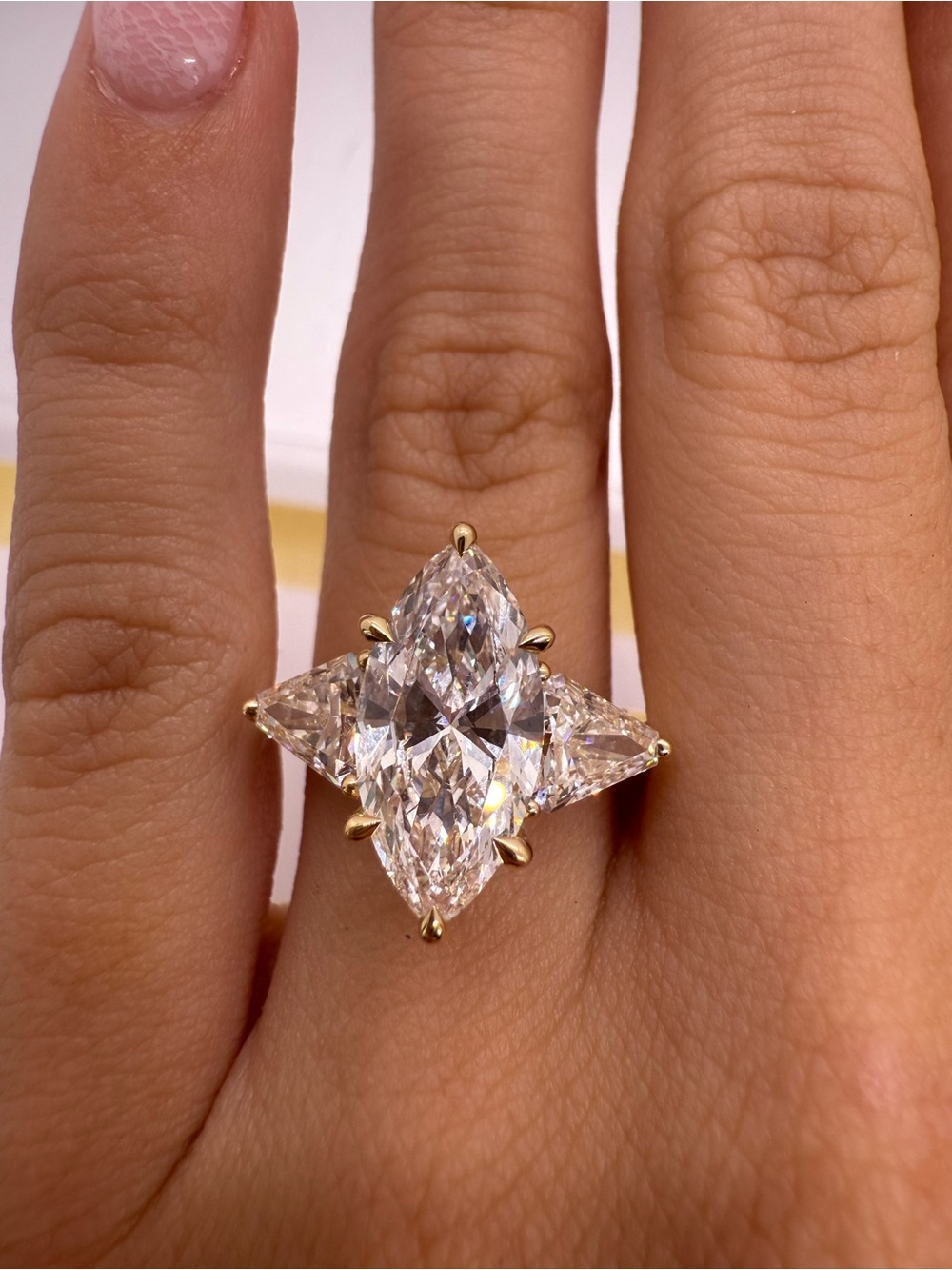 3.02 carat e vs1 marquise lab diamond three stone engagement ring with trillions